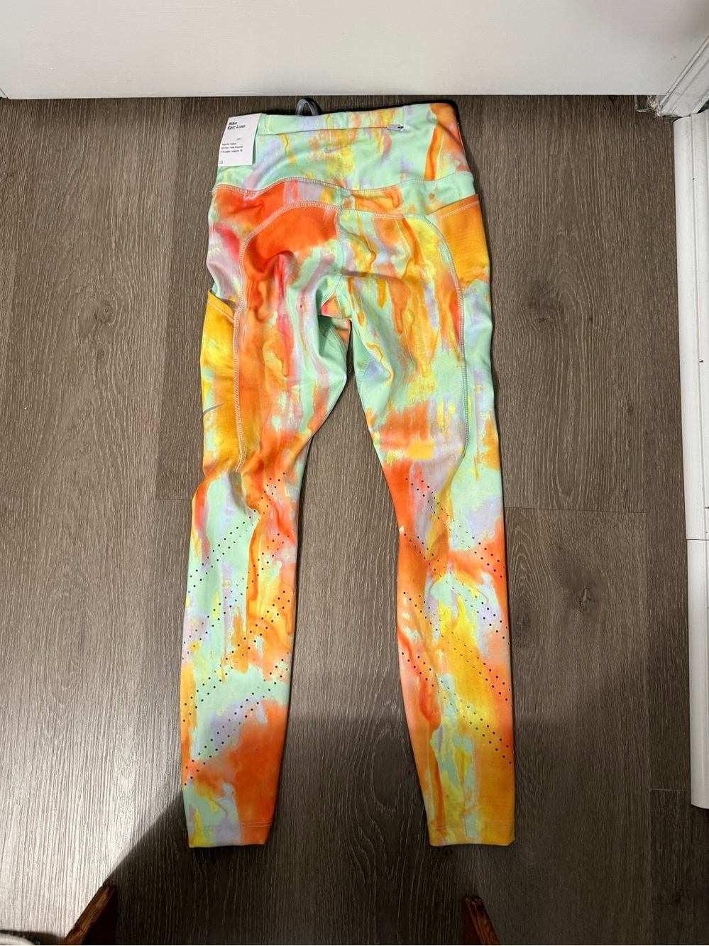 Nike women’s Tie-Dye Leggings in Orange and Mint